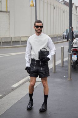 MILAN, ITALY - JANUARY 15, 2023: Pelayo Diaz before Prada fashion show, Milan Fashion Week street style