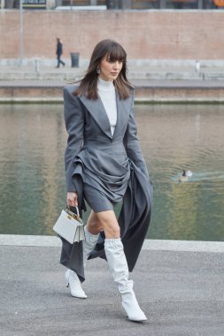 MILAN, ITALY - FEBRUARY 24, 2023: Mary Leest before Sportmax fashion show, Milan Fashion Week street style clipart