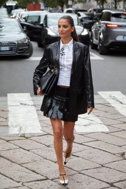 MILAN, ITALY - SEPTEMBER 17, 2024: Gabrielle Caunesil Pozzoli before Alberta Ferretti fashion show, Milan street style clipart