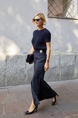 MILAN, ITALY - SEPTEMBER 21, 2024: Jenny Walton before Bally fashion show, Milan street style clipart