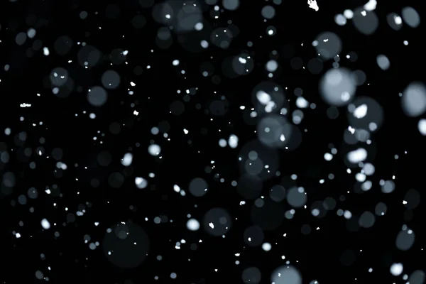 Bokeh Borroso Nieve Blanca Cayendo Sobre Fondo Negro — Foto de Stock