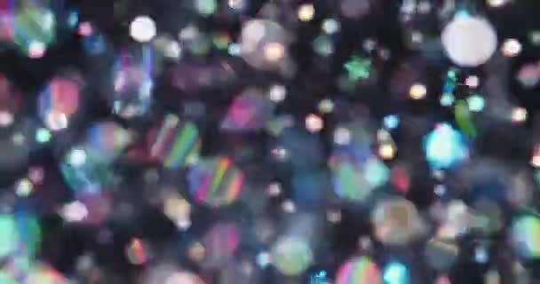 柔和而模糊的亮晶晶背景 有闪亮的漂浮粒子 有闪烁的彩虹反射 — 图库视频影像