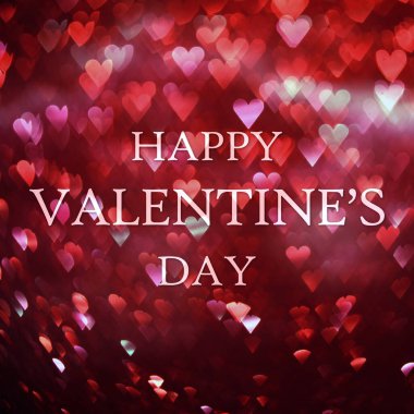 Parlak kırmızı kalpler soyut bokeh arkaplanı