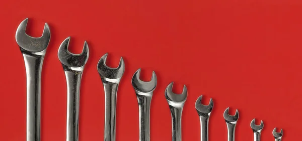 Set Worn Used Wrenches Lined Red Background — Stock Photo, Image