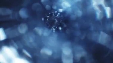 Parlayan ışıkların dönen girdabı, ya da soyut bilim kurgu ya da fantezi portalı.