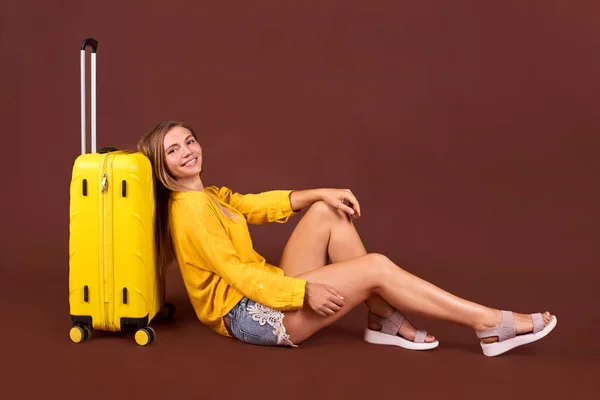 stock image woman choosing quality suitcase. travel essentials, put things in suitcase. planing summer trip and vacation