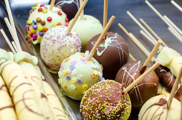 stock image Apples covered in chocolate for sale at the fair.