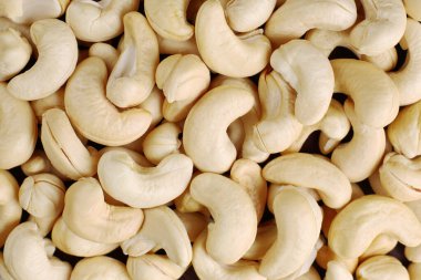 Kaju fıstığı. Tam kare arkaplan. Sağlıklı vejetaryen organik atıştırma konsepti.