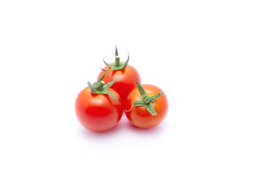 Fresh tasty red cherry tomatoes on white background