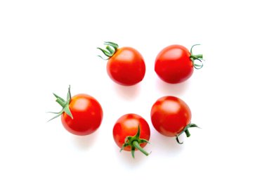 Fresh tasty red cherry tomatoes on white background