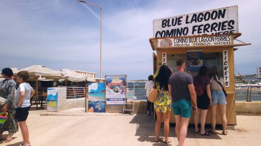 Cirkewwa, Malta 29.05.2024 - Cirkewwa Ferry terminal and a shop for tickets for a speed boat ferry to Blue Lagoon, Comino island. High quality photo clipart