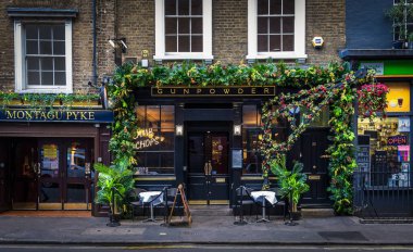 London, UK, Sept 2022, view of The Montagu pub and Gunpowder restaurant in Greek st, Soho