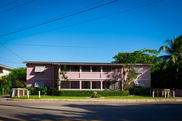 stock image Grand Cayman, Cayman Islands, Jan 2023, view of a pink residential building in George Town