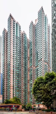 Hong Kong, Hong Kong Island, Jan 28th 2024, view of an urban scene by some colorful skyscrapers on Queen's Road Central in Sheung Wan district