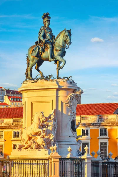 Lisbon, Portugal. Monument in honor of King Jose on the horse at Central Commercial square area. Evening sunset blue sky and clouds. Historical centre old town Lisboa