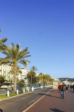 GÜZEL, FRANCE - 25 HAZİRAN 2024: Nice, Provence Alpes-Cote d 'Azur, Fransa' nın sahil caddesinin günbatımı Panoraması