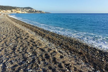 GÜZEL, FRANCE - 25 HAZİRAN 2024: Nice, Provence Alpes-Cote d 'Azur, Fransa' nın sahil caddesinin günbatımı Panoraması