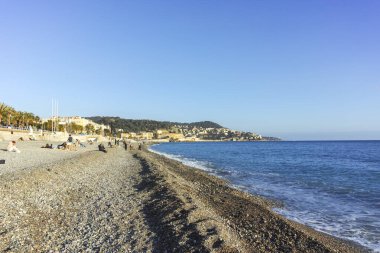GÜZEL, FRANCE - 25 HAZİRAN 2024: Nice, Provence Alpes-Cote d 'Azur, Fransa' nın sahil caddesinin günbatımı Panoraması