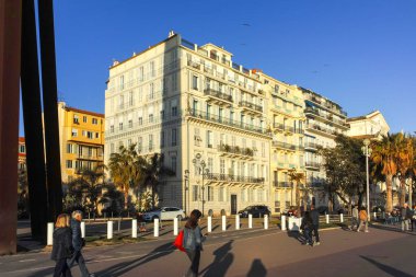 GÜZEL, FRANCE - 25 HAZİRAN 2024: Nice, Provence Alpes-Cote d 'Azur, Fransa' nın sahil caddesinin günbatımı Panoraması