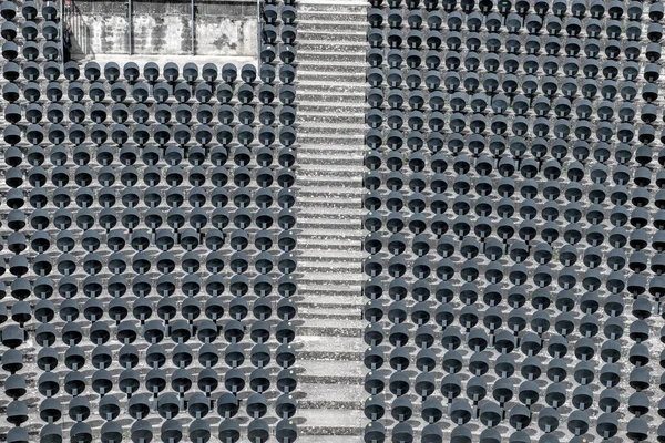 row of chairs in an open-air theater
