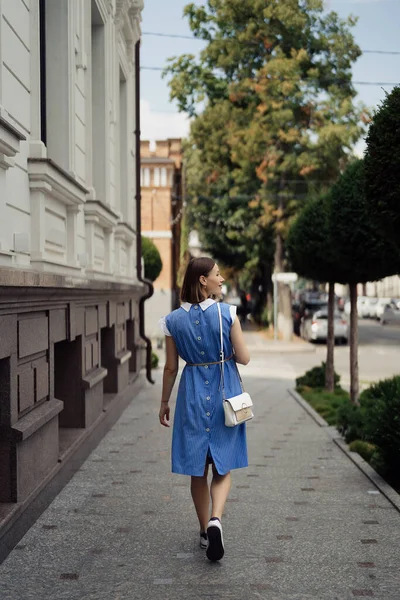 Back View Woman Blue Midi Dress Walking City Street White — Foto Stock