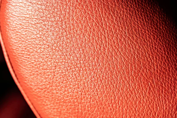 Red leather texture of car seat interior