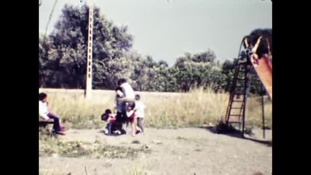 Rhodes Greece June 1981 Children Play Playground Park 80S — Stock Video