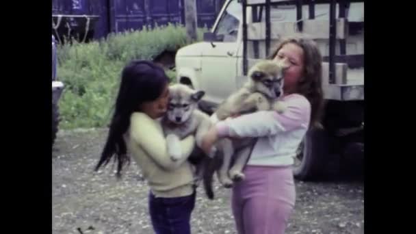 Kotzebue United States July 1987 Girls Holding Two Aski Puppies — Stock Video