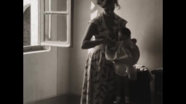 Dolomites Italy May 1955 Mom Changes Child Home 50S Scene — Vídeo de stock