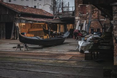 Scene of Gondola construction workshop in Venice clipart