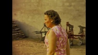 Copenhagen, Denmark may 1968: A group of people relive memories from their homes in the 60s.