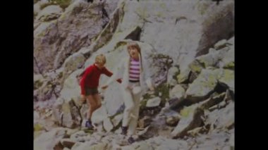 Dolomites, Italy May 1968: Take a trip back in time with this vintage video of a family vacation in the beautiful Dolomites. Relive memories from the 70s and admire the stunning mountain landscapes.