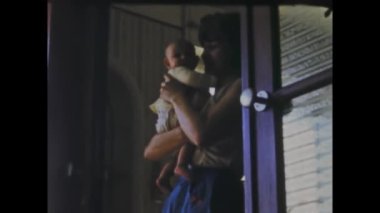 Thimister-Clermont, belgium may 1970: A historical video showcasing a newborn baby and family memories in the 1970s.