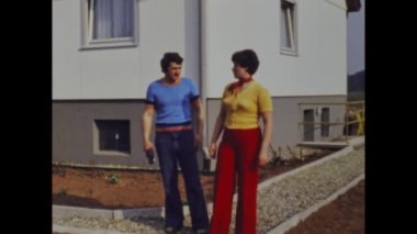 Berlin, Germany may 1975: Relive the memories of people enjoying the countryside around a German house in the 1970s through this historic video.