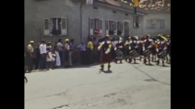 Berlin, Germany june 1975: A historic video showcasing a Carnival parade in a European town in the 1970s, capturing the vibrant celebration of tradition and culture in this region