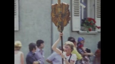 Berlin, Germany june 1975: A historic video showcasing a Carnival parade in a European town in the 1970s, capturing the vibrant celebration of tradition and culture in this region