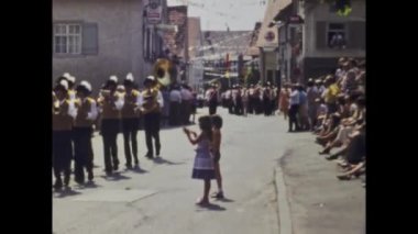 Berlin, Germany june 1975: A historic video showcasing a Carnival parade in a European town in the 1970s, capturing the vibrant celebration of tradition and culture in this region