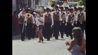 Berlin, Germany june 1975: A historic video showcasing a Carnival parade in a European town in the 1970s, capturing the vibrant celebration of tradition and culture in this region