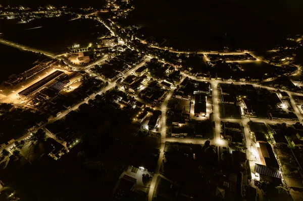 Veduta Aerea Una Città Notte Con Lampioni Che Creano Una — Foto Stock