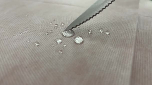 Close View Water Droplets Glistening Colorful Tablecloth — Stock Video