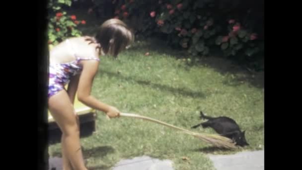 Tenerife Spain May 1975 Young Girl 70S Playfully Teases Cat — Stock Video
