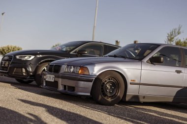 Adria, Italy 30 july 2024: Multiple cars parked at a gas station, ready for refueling on a sunny day clipart