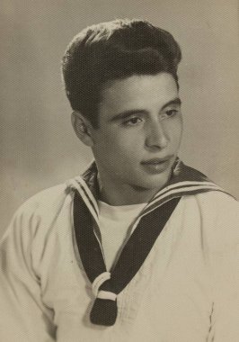 Rome, Italy may 1965: Studio portrait capturing young sailor wearing classic uniform with neckerchief, representing fashion and military styles of the mid-20th century clipart