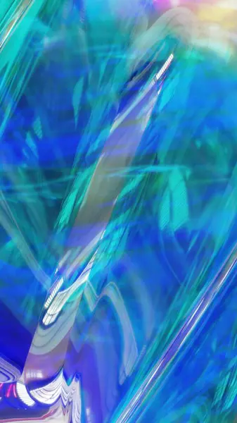 Pürüzsüz, akışkan camsı dalgaların parlak yansımaları ve yumuşak ışıklandırmasıyla mavi ve yeşil tonlarda olduğu çarpıcı bir 3 boyutlu soyut arka plan..