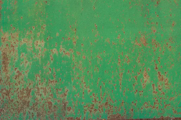 Paslı, eski bir boyanın kabuğu soyulmuş ve soyulmuş metal bir yüzey.