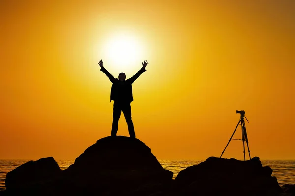 Man Stands Atop Hill His Arms Raised High Air Triumphant — Stock Photo, Image