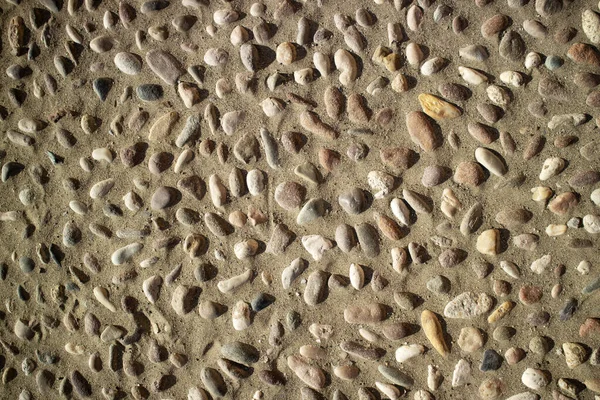 Nehir Taşları Kumdan Yapılmış Açık Bir Zemin Belgesi — Stok fotoğraf