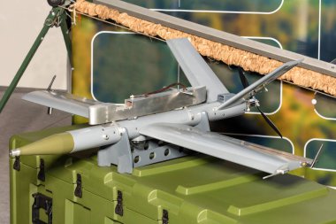 Military production, unmanned aerial vehicle, kamikaze drone loitering projectile launched by catapult. Close-up.