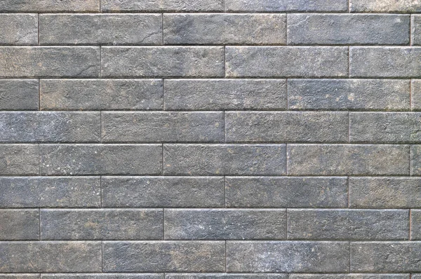 Gestructureerde Achtergrond Van Rechthoekige Donkere Stenen Tegels Met Schuurtjes Gelijke — Stockfoto