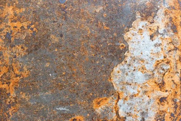 金属の黒いシートの表面に突き出た錆の質感 — ストック写真